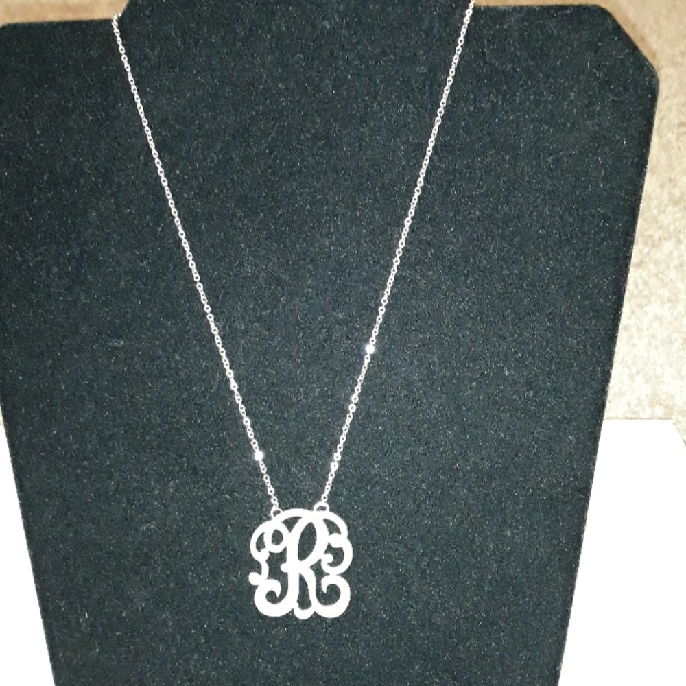 Sterling silver "R" initial necklace.
